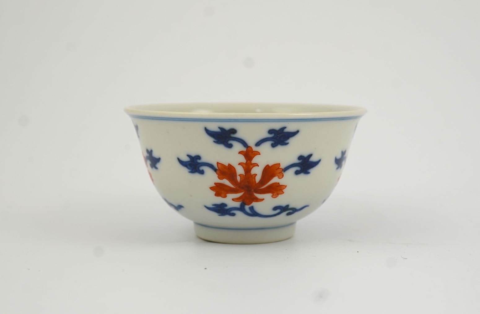 A Chinese underglaze blue and iron red bowl, Daoguang seal mark and possibly of the period